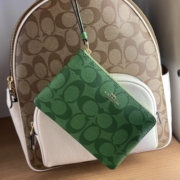 Coach Corner Zip Wristlet In Signature Canvas 
Im/Neon Green - Picture 16 of 16